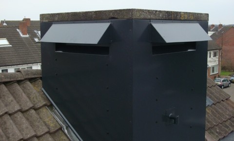 Schuine overzetschoorsteenkap